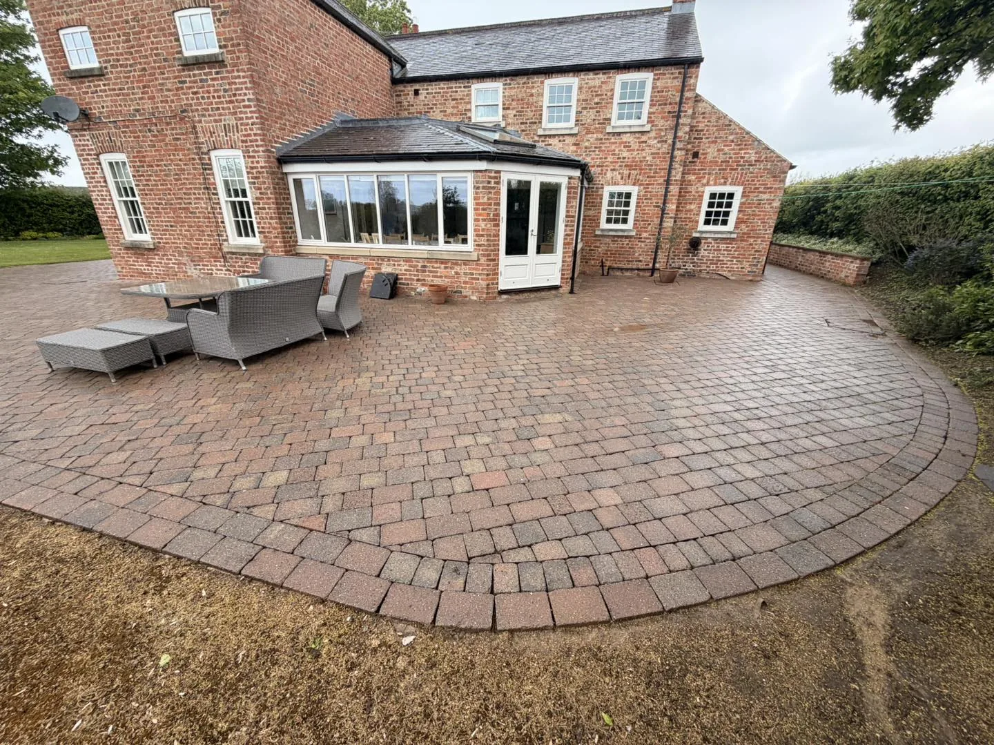Large rear patio in Thirsk, before and after cleaning